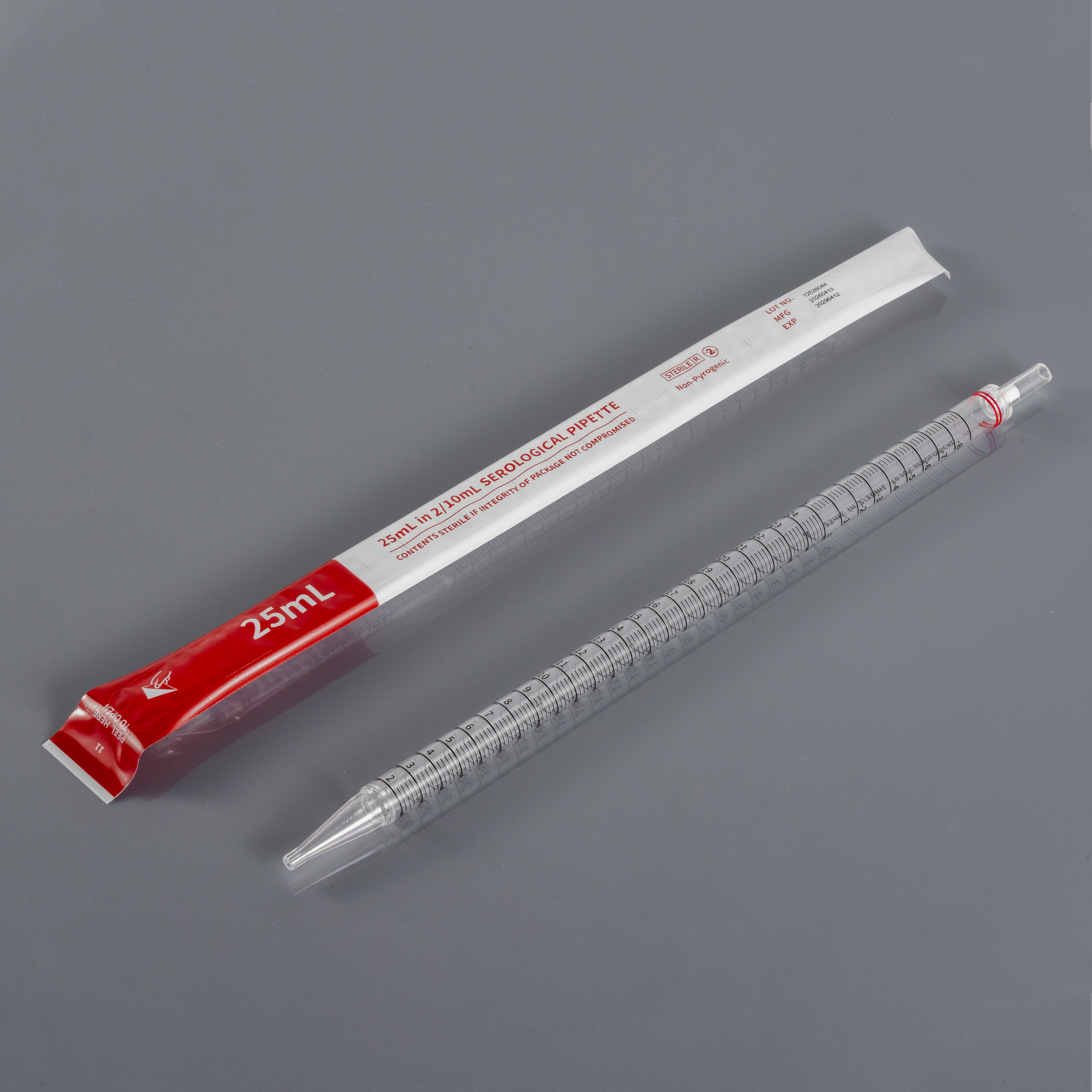 Laboratory technician using a sterile serological pipette under a biosafety cabinet